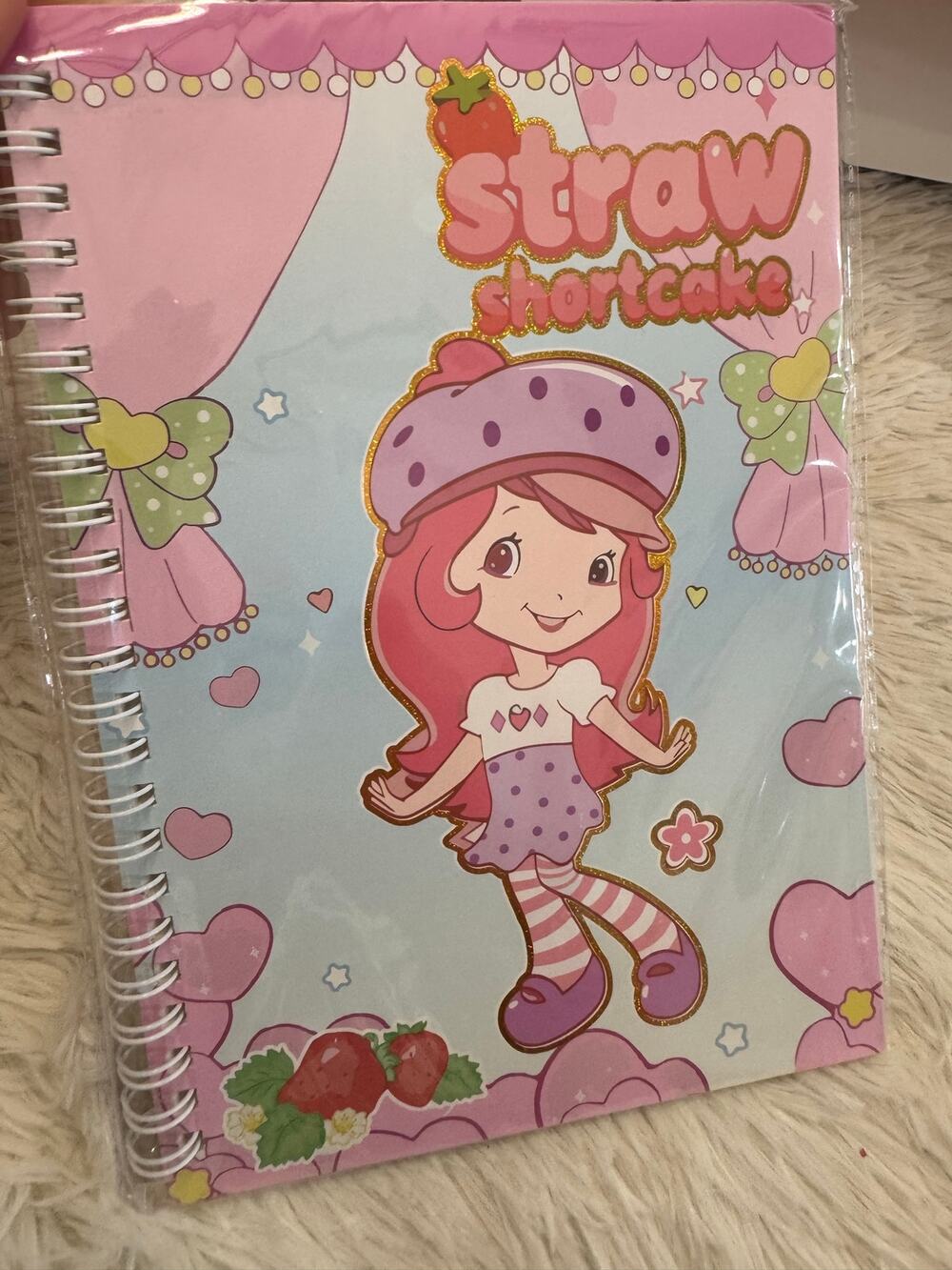 Strawberry Shortcake A5 spiral notebook with pink background hearts strawberries